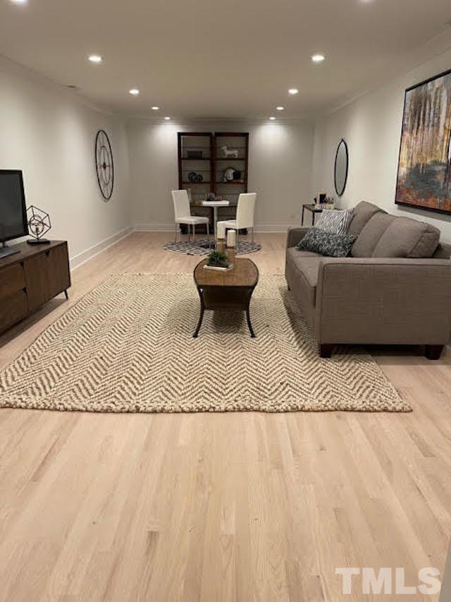 3806 Regent Road Durham, NC 27707 - Photo 21 of 21 a living room with furniture and a wooden floor