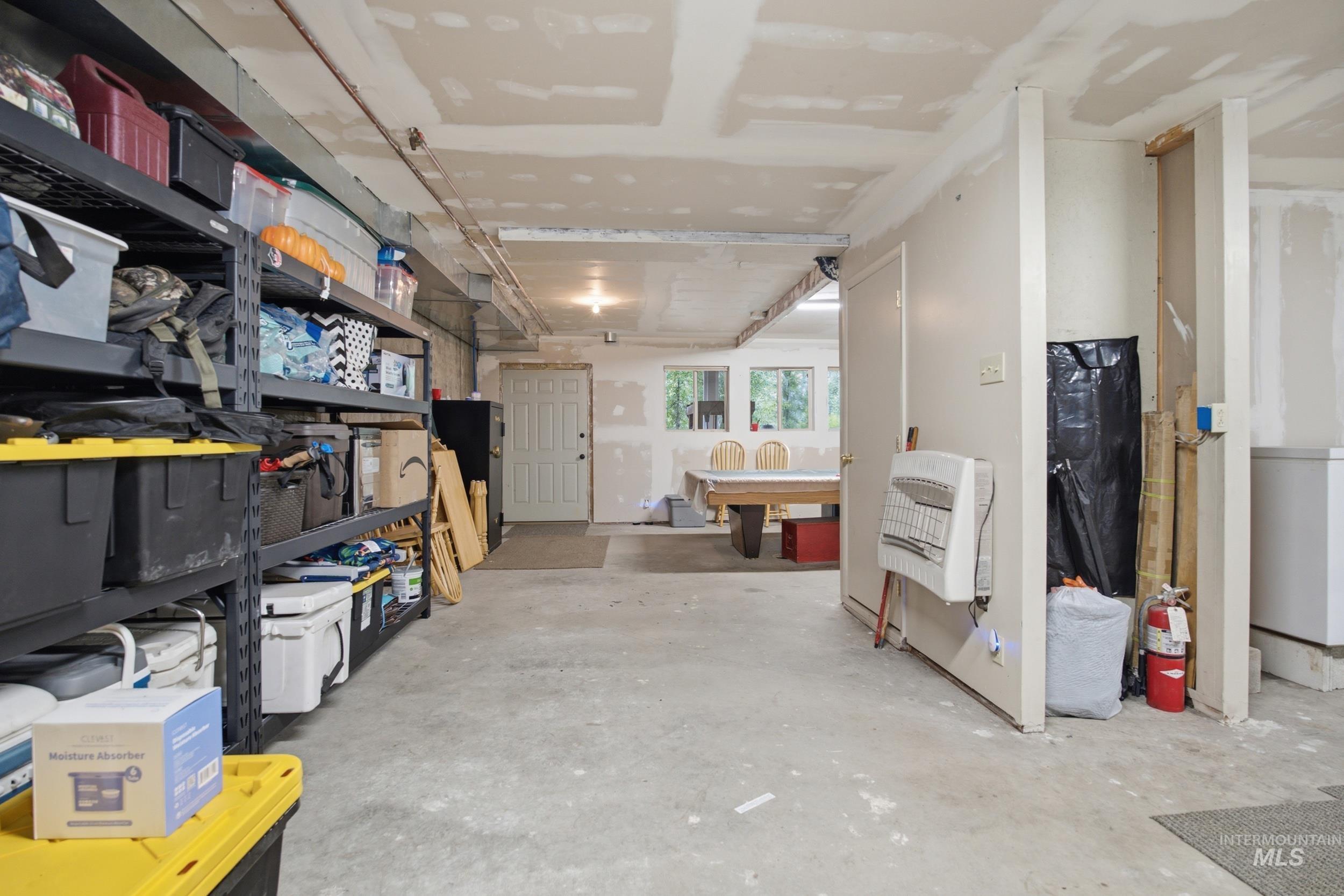 3980 North Pine-Featherville Road Mountain Home, ID 83647 - Photo 21 of 35 Spacious unfinished basement with concrete flooring and drywall ceiling