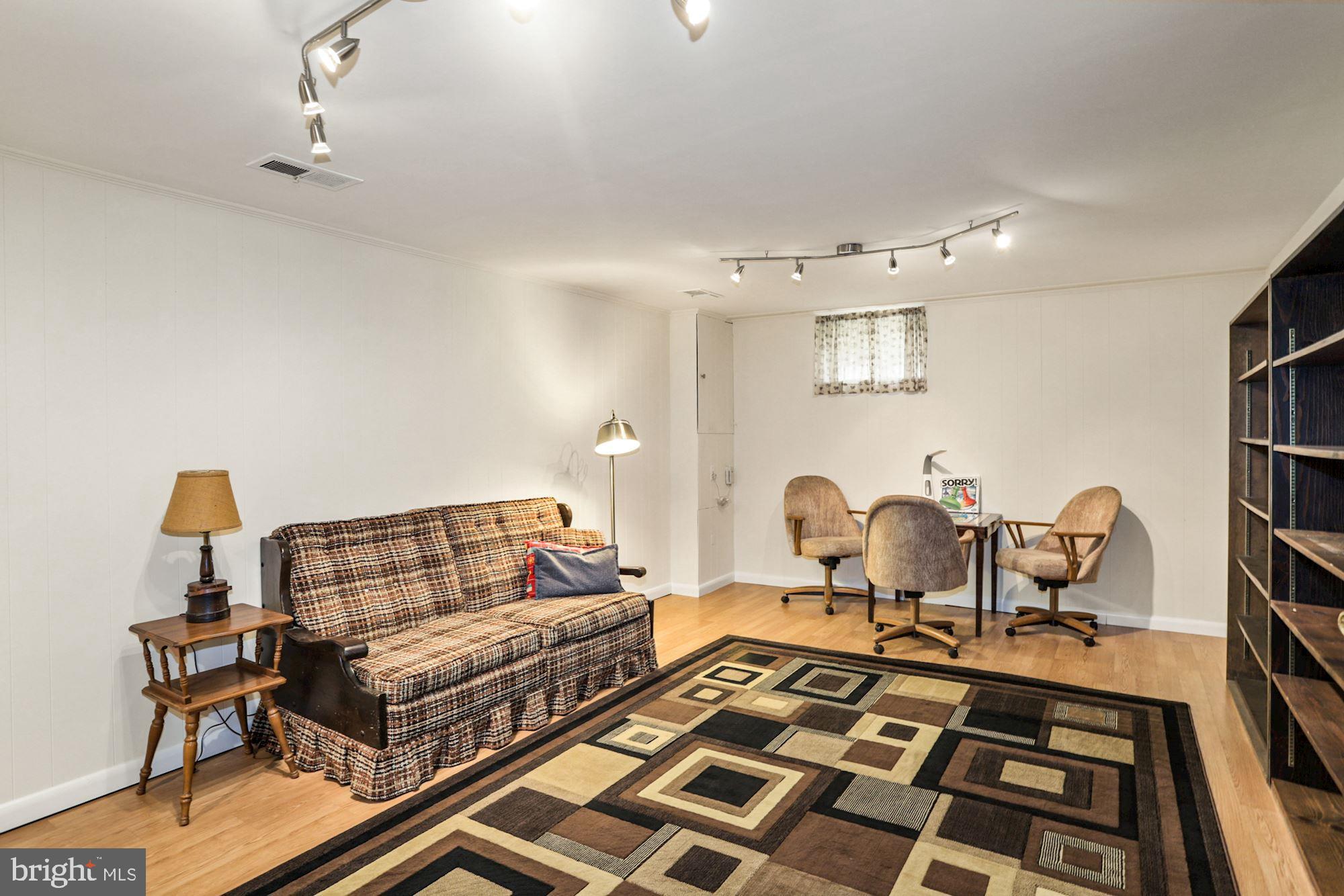 14804 Notley Road Silver Spring, MD 20905 - Photo 22 of 27 Freshly painted rec room