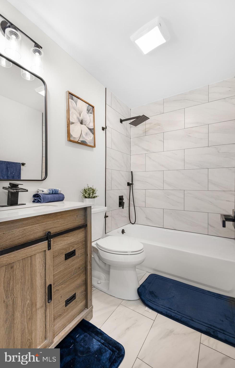 63 Childs Road Elkton, MD 21921 - Photo 12 of 44 a bathroom with a sink a toilet and a bathtub