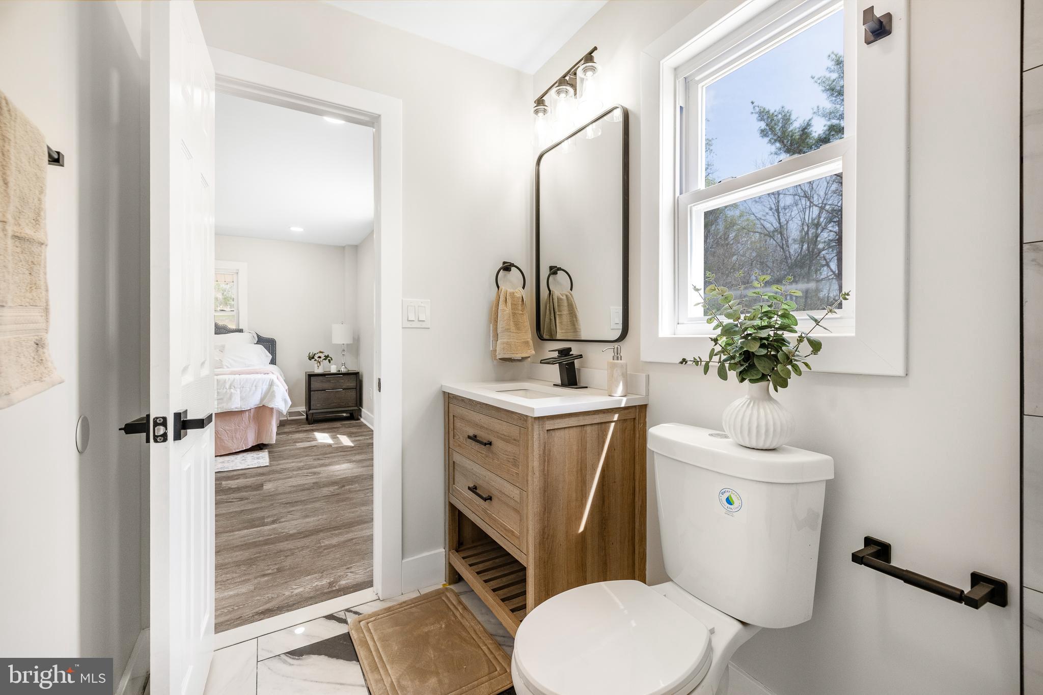 63 Childs Road Elkton, MD 21921 - Photo 20 of 44 a bathroom with a sink toilet and shower