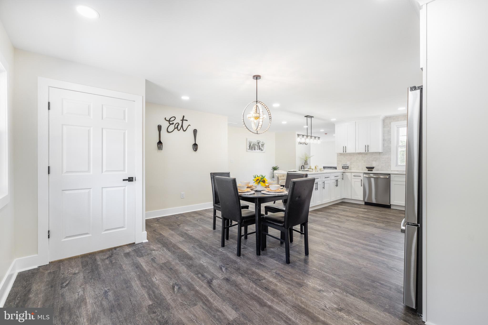63 Childs Road Elkton, MD 21921 - Photo 9 of 44 a view of a dining room with furniture and wooden floor