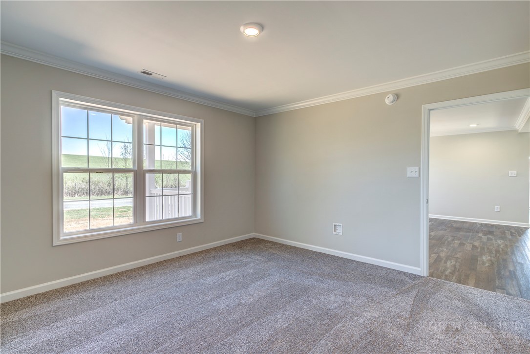 1052 Halsey Knob Road Sparta, NC 28675 - Photo 19 of 28 an empty room with a window