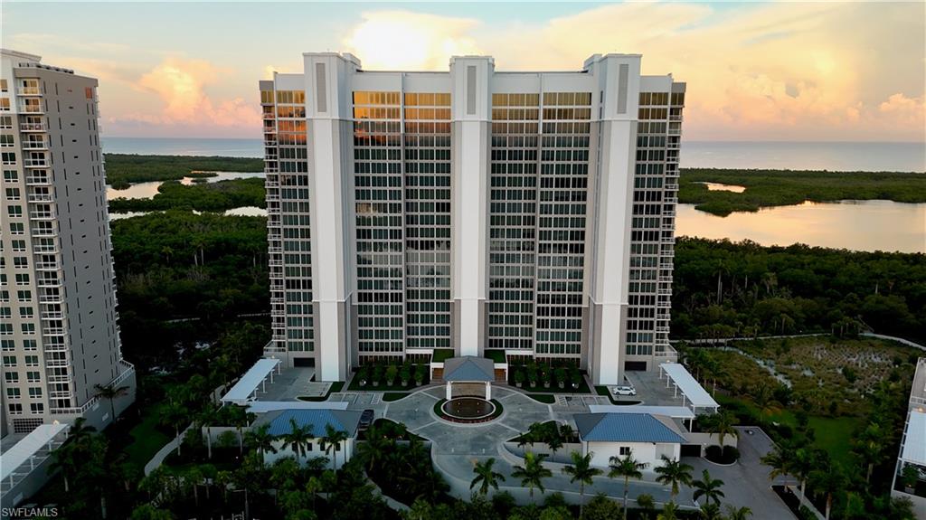13925 Old Coast Road, Unit 905 Naples, FL 34110 - Photo 33 of 48 a view of a city with tall buildings