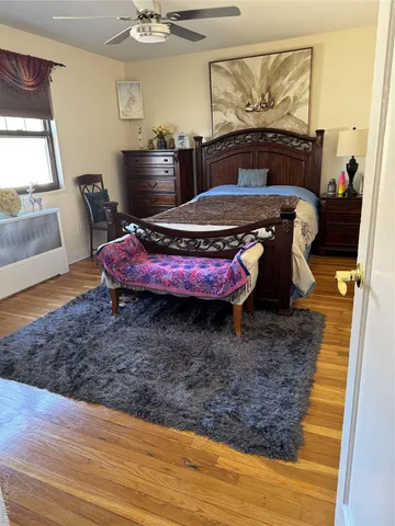 a room with furniture and wooden floor