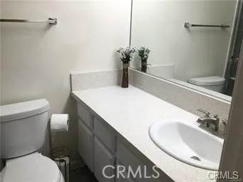 a bathroom with a sink and a toilet