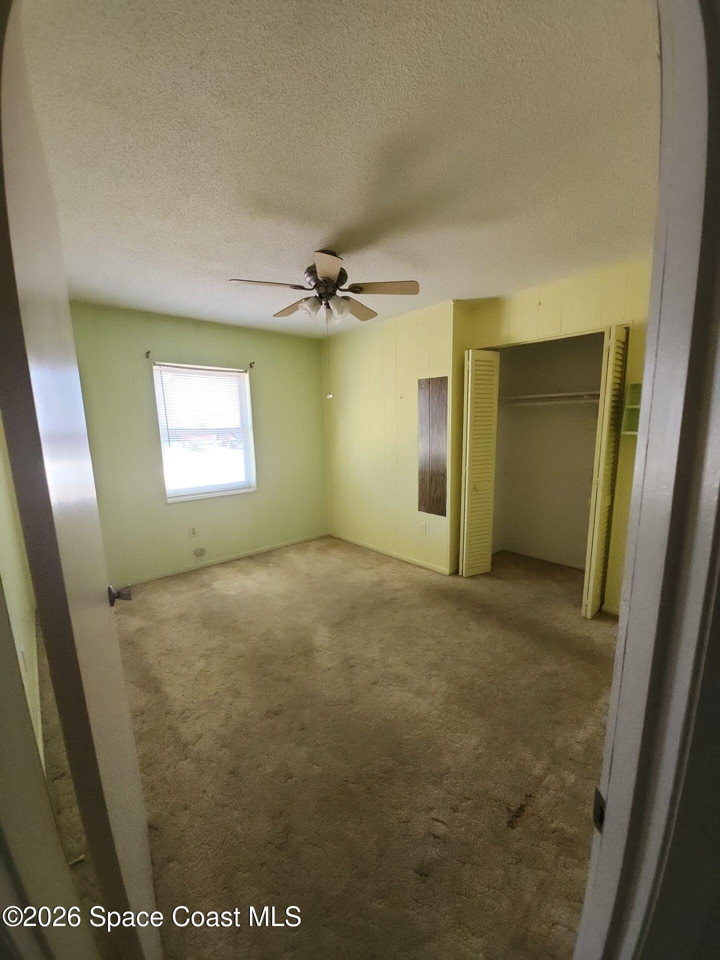 1654 Rice Avenue Titusville, FL 32796 - Photo 11 of 18 a view of an empty room and a window