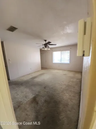 a view of a livingroom with a window