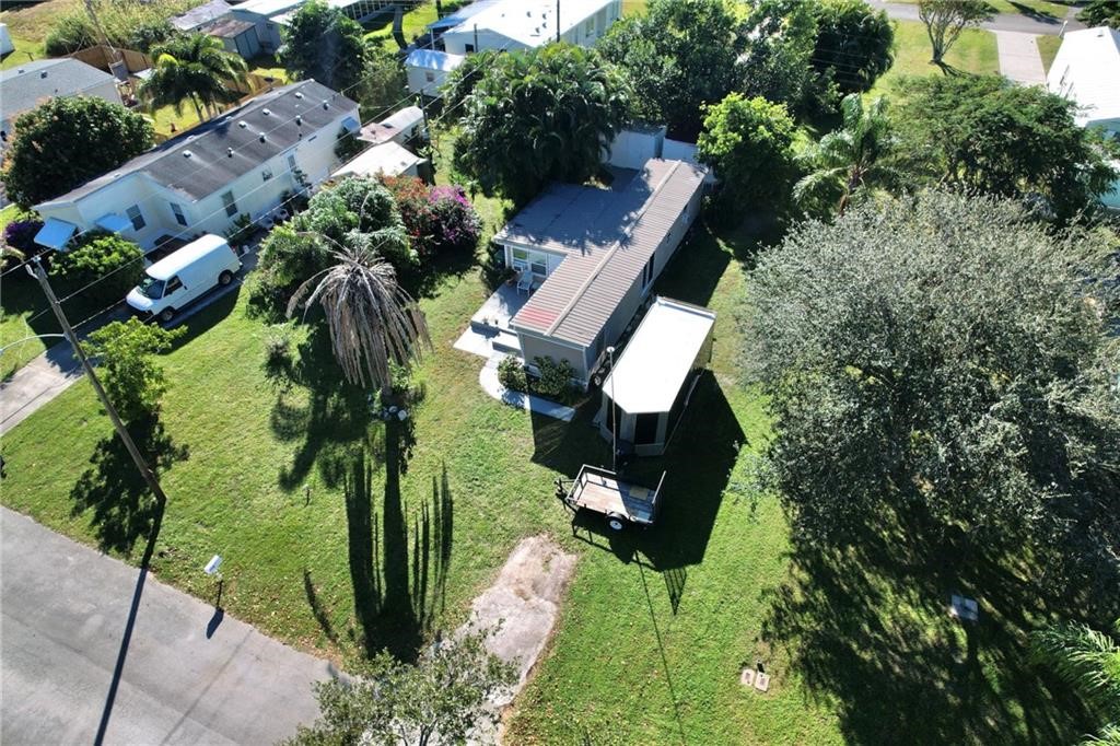 Undisclosed Address Sebastian, FL 32958 - Photo 2 of 6 an aerial view of garden with swimming pool