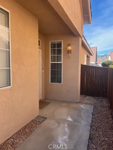 a view of backyard with hardwood and deck