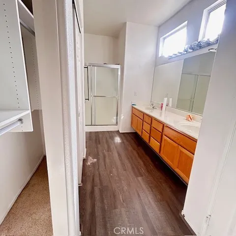 a bathroom with a vanity mirror and a sink