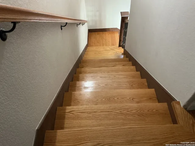 a view of a room with a large window