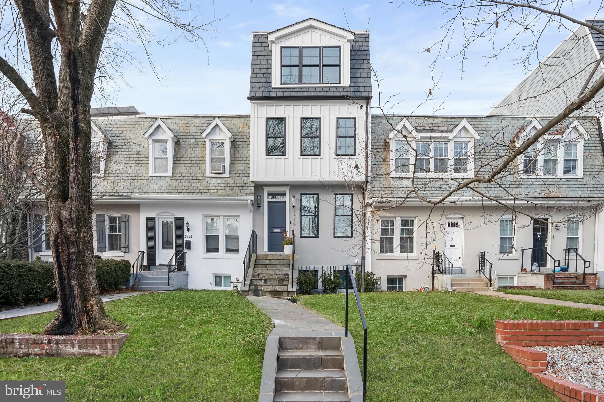 3719 R Street Northwest Washington, DC 20007 - Photo 43 of 44 a front view of a house with a yard