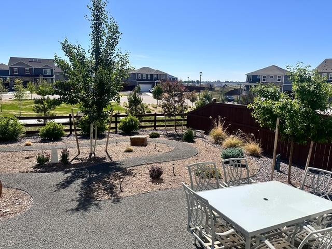 439 Bluebird Road Johnstown, CO 80534 - Photo 29 of 36 a view of a terrace with furniture and outdoor space