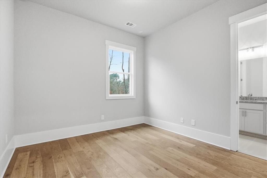 216 Ewing Way Dacula, GA 30019 - Photo 49 of 80 an empty room with a window
