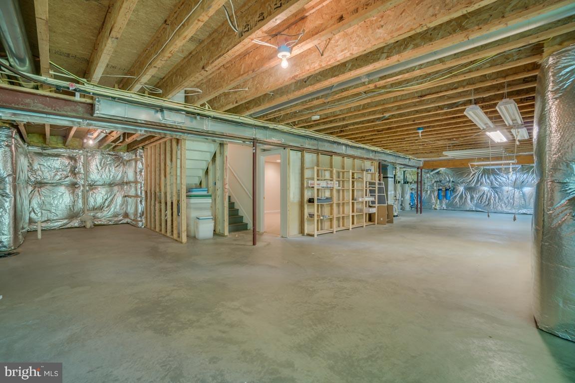 6444 St Pauls Road King George, VA 22485 - Photo 39 of 42 Unfinished basement to design on your own!