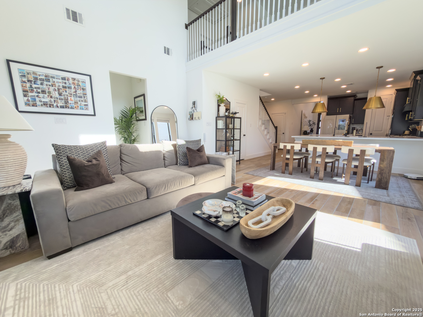 416 Kimble Creek Loop Kyle, TX 78640 - Photo 12 of 29 a living room with furniture and view of kitchen