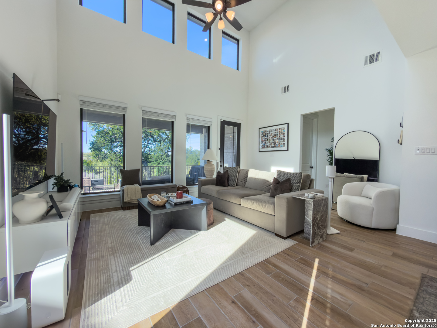 416 Kimble Creek Loop Kyle, TX 78640 - Photo 14 of 29 a living room with furniture or couch and a large window