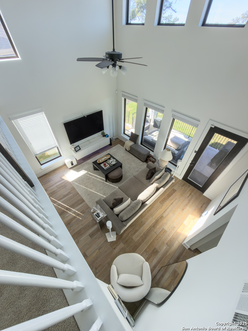 416 Kimble Creek Loop Kyle, TX 78640 - Photo 23 of 29 a living room with furniture and a couch