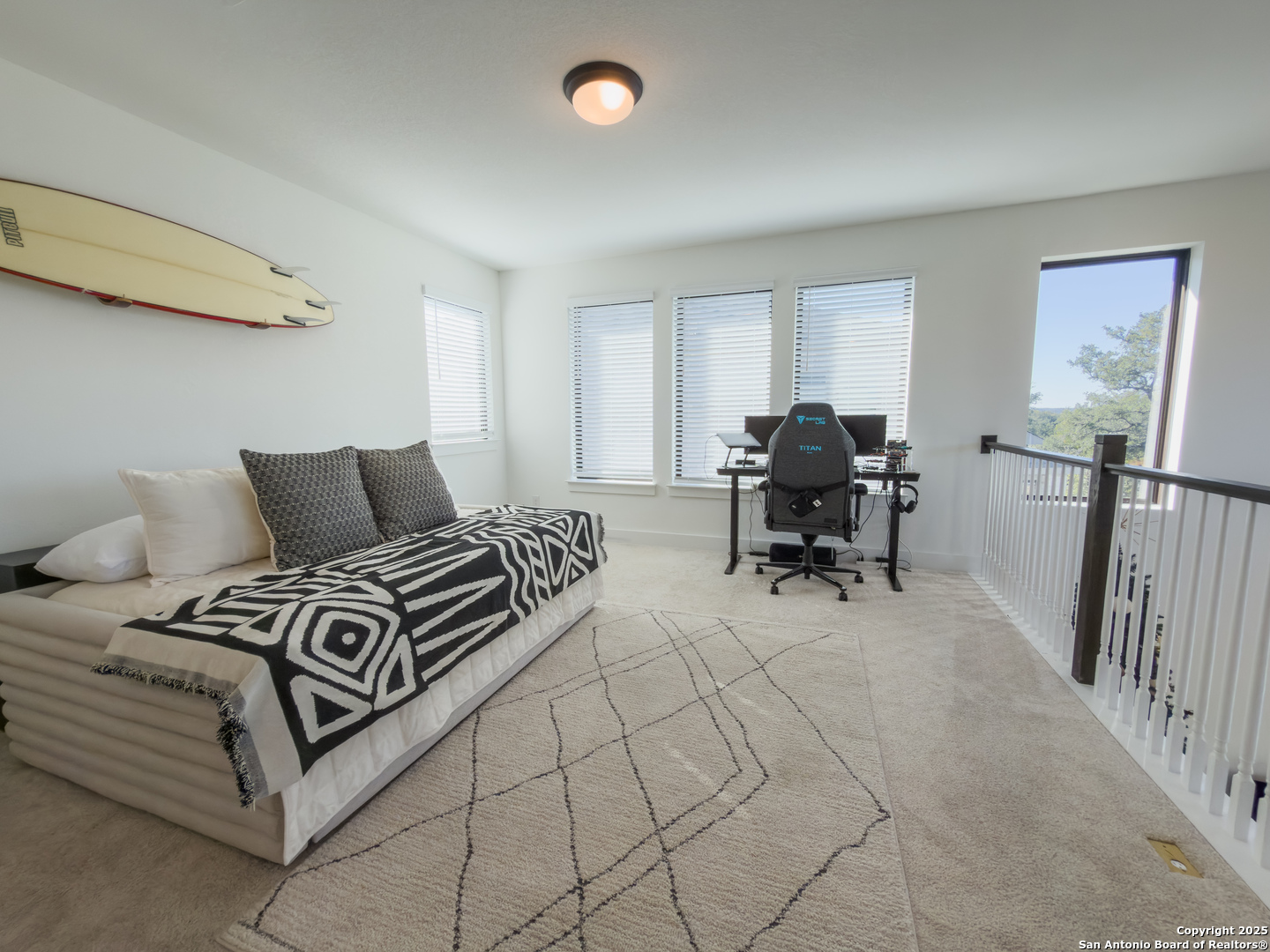 416 Kimble Creek Loop Kyle, TX 78640 - Photo 25 of 29 a bedroom with furniture and a window