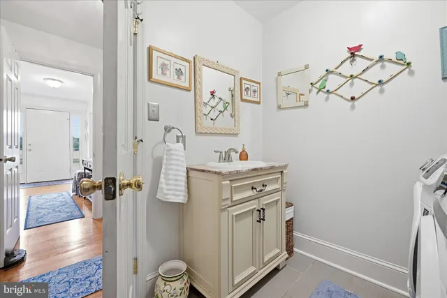 a view of a livingroom with furniture and a window