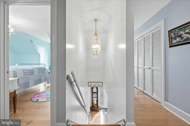 a bathroom with a sink a mirror and a toilet