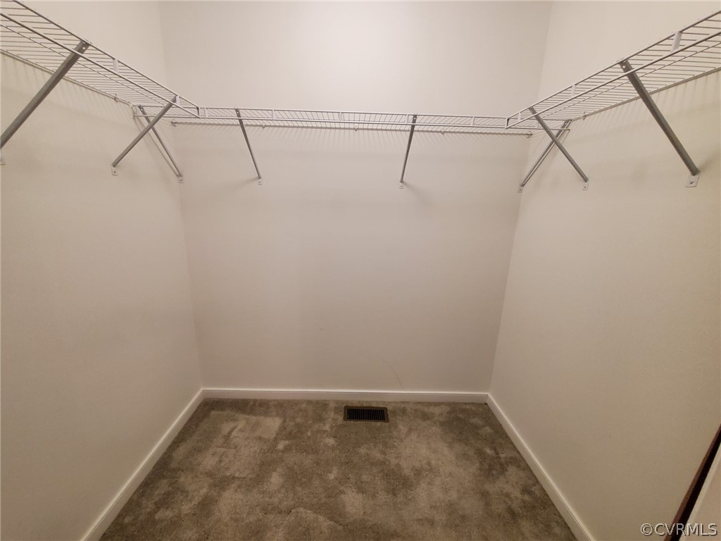10140 Reed Rock Road Amelia Court House, VA 23002 - Photo 18 of 27 a view of a room with racks on the wall