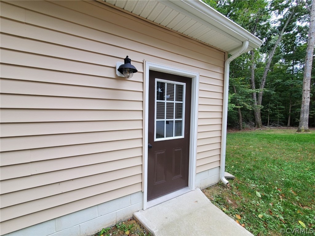 10140 Reed Rock Road Amelia Court House, VA 23002 - Photo 5 of 27 a view of backyard with cabin