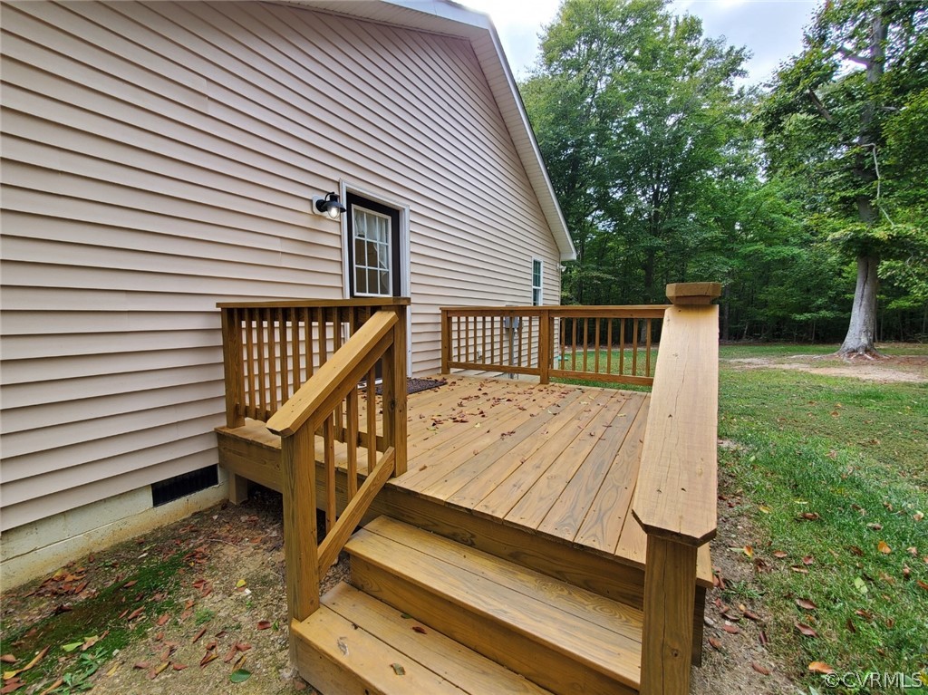10140 Reed Rock Road Amelia Court House, VA 23002 - Photo 9 of 27 a view of backyard with deck and trees