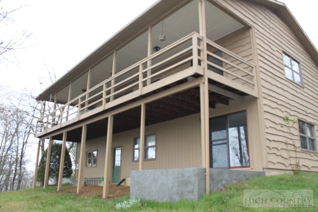 372 Heritage Ridge Road Boone, NC 28607 - Photo 13 of 34 a front view of a house with a yard