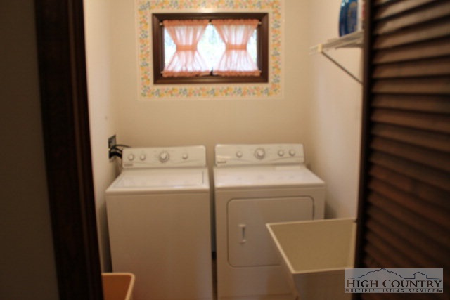 372 Heritage Ridge Road Boone, NC 28607 - Photo 16 of 34 a utility room with dryer and washer