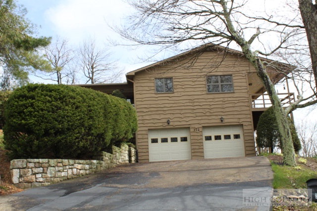 372 Heritage Ridge Road Boone, NC 28607 - Photo 31 of 34 a view of a house with a yard