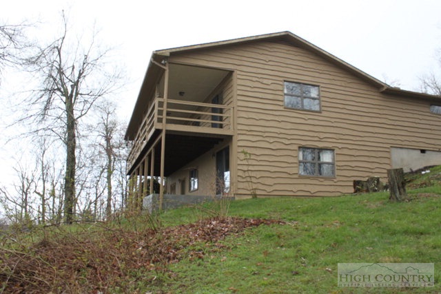 372 Heritage Ridge Road Boone, NC 28607 - Photo 33 of 34 a front view of a house with garden
