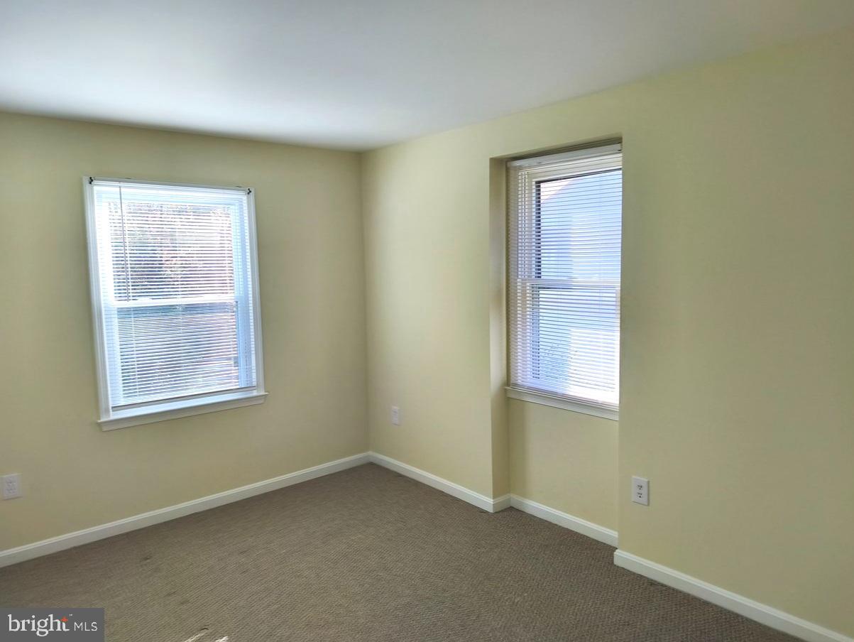 12452 Sweet Leaf Terrace Fairfax, VA 22033 - Photo 26 of 38 an empty room with a window