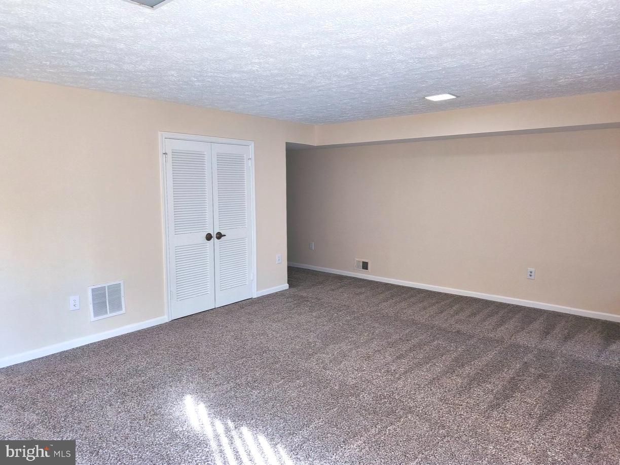 12452 Sweet Leaf Terrace Fairfax, VA 22033 - Photo 31 of 38 a view of an empty room