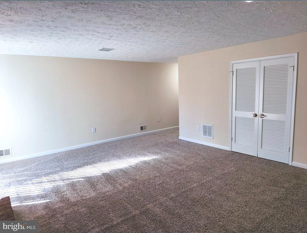 12452 Sweet Leaf Terrace Fairfax, VA 22033 - Photo 34 of 38 a view of an empty room