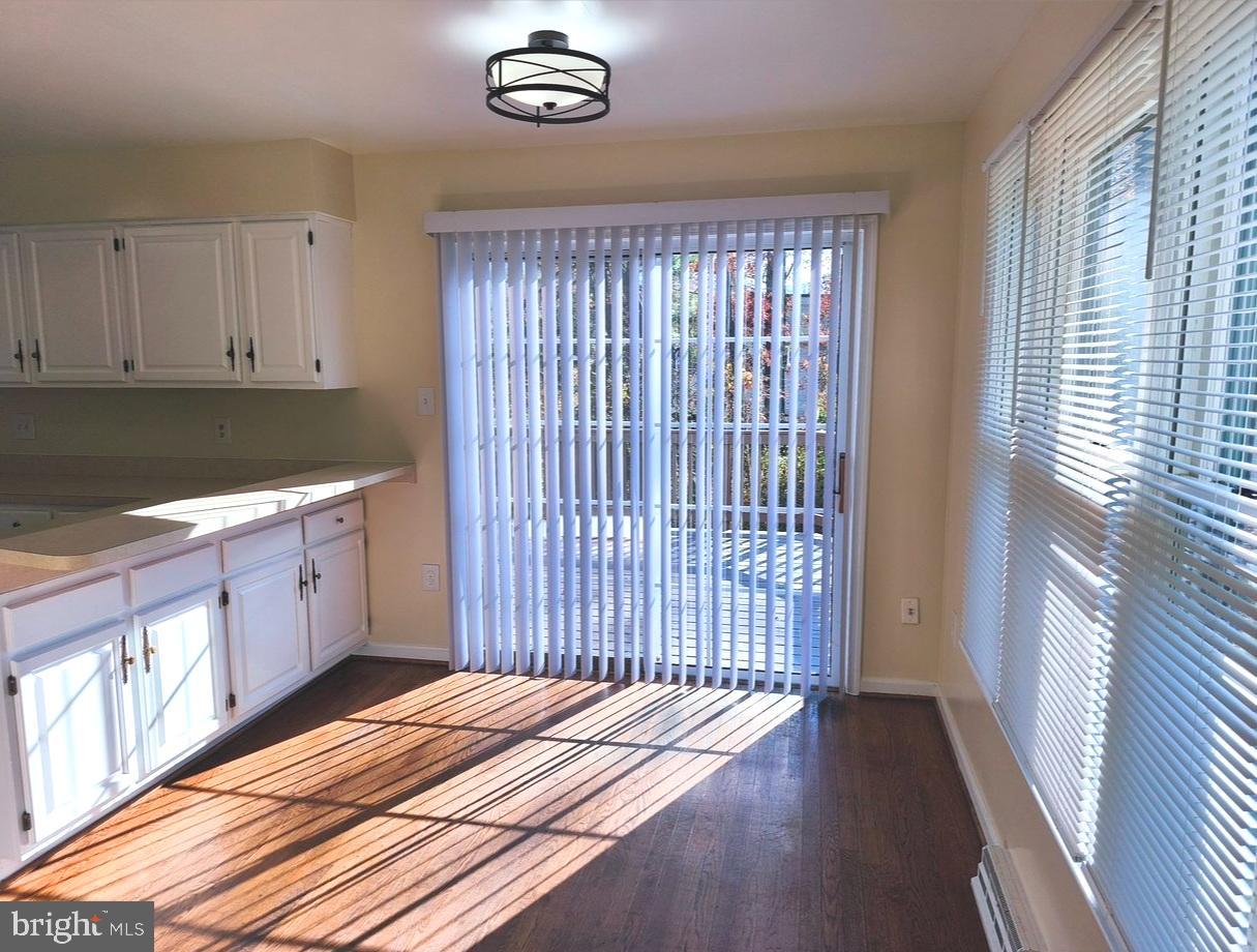12452 Sweet Leaf Terrace Fairfax, VA 22033 - Photo 9 of 38 a view of a kitchen from the stairs