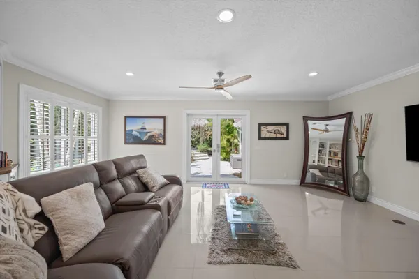 a view of a dining room and livingroom with furniture