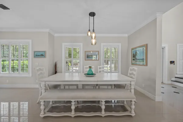 a kitchen with sink cabinets and window