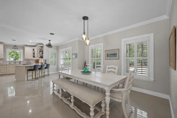 a kitchen with granite countertop stainless steel appliances and sink
