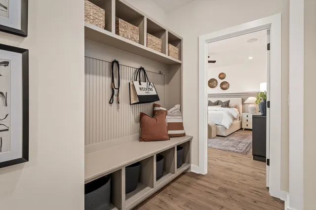 a view of living room with furniture and wooden floor