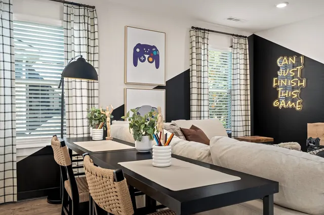 a view of a dining room with furniture