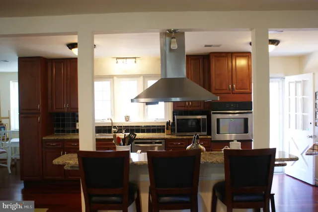 a dining room with a table chairs and a dining table