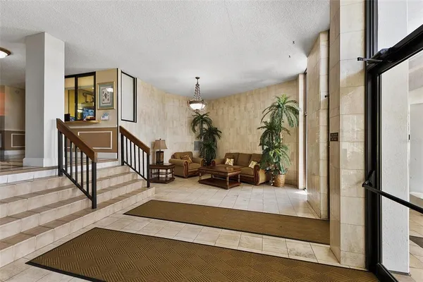 a view of a balcony with ocean view