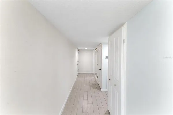 a view of a room with windows