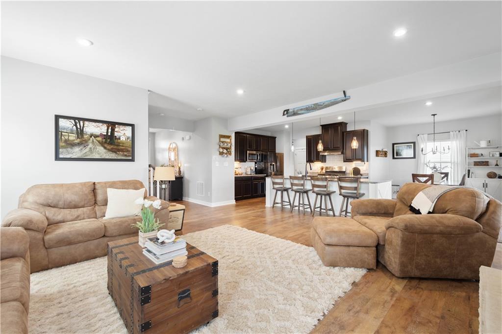 234 Regency Drive Eighty Four, PA 15330 - Photo 13 of 47 a living room with furniture wooden floor and a kitchen view