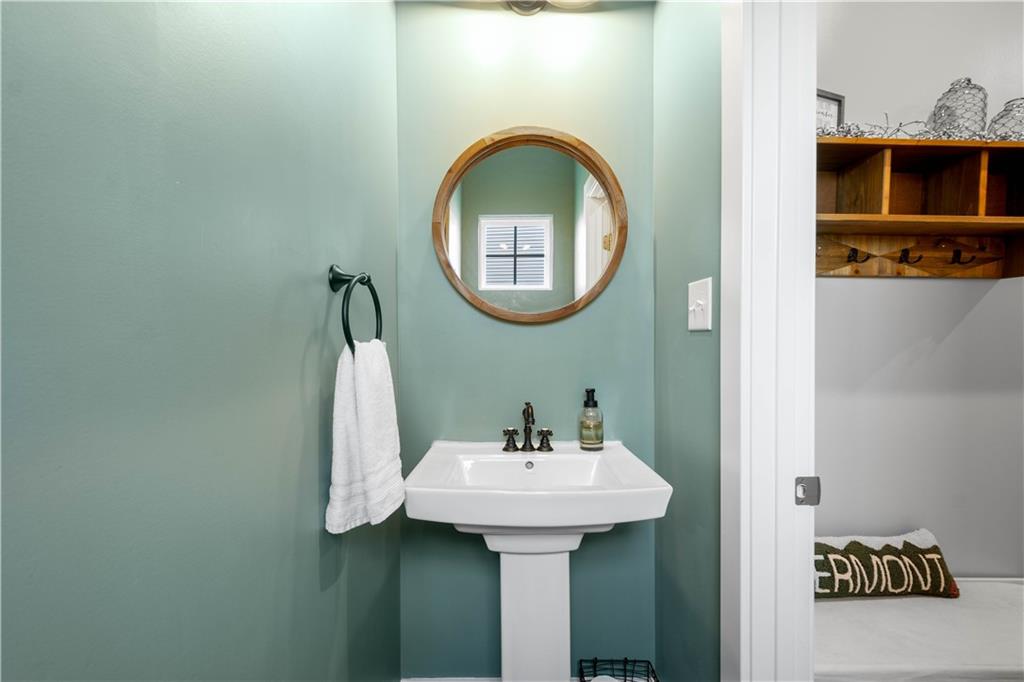 234 Regency Drive Eighty Four, PA 15330 - Photo 14 of 47 a bathroom with a sink and a mirror