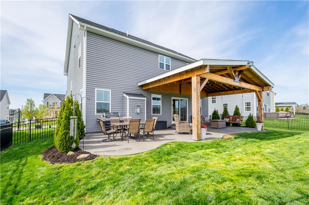 234 Regency Drive Eighty Four, PA 15330 - Photo 3 of 47 a view of a chair and table in backyard of the house