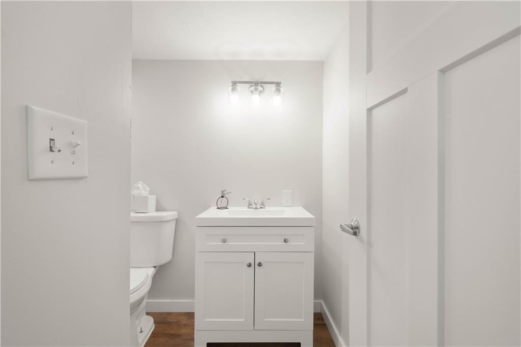 234 Regency Drive Eighty Four, PA 15330 - Photo 32 of 47 a bathroom with a sink a toilet and a mirror