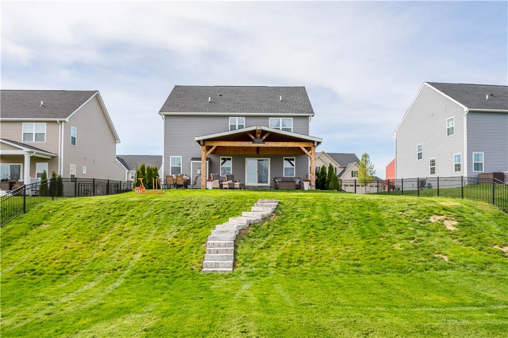 234 Regency Drive Eighty Four, PA 15330 - Photo 38 of 47 a front view of a house with a yard